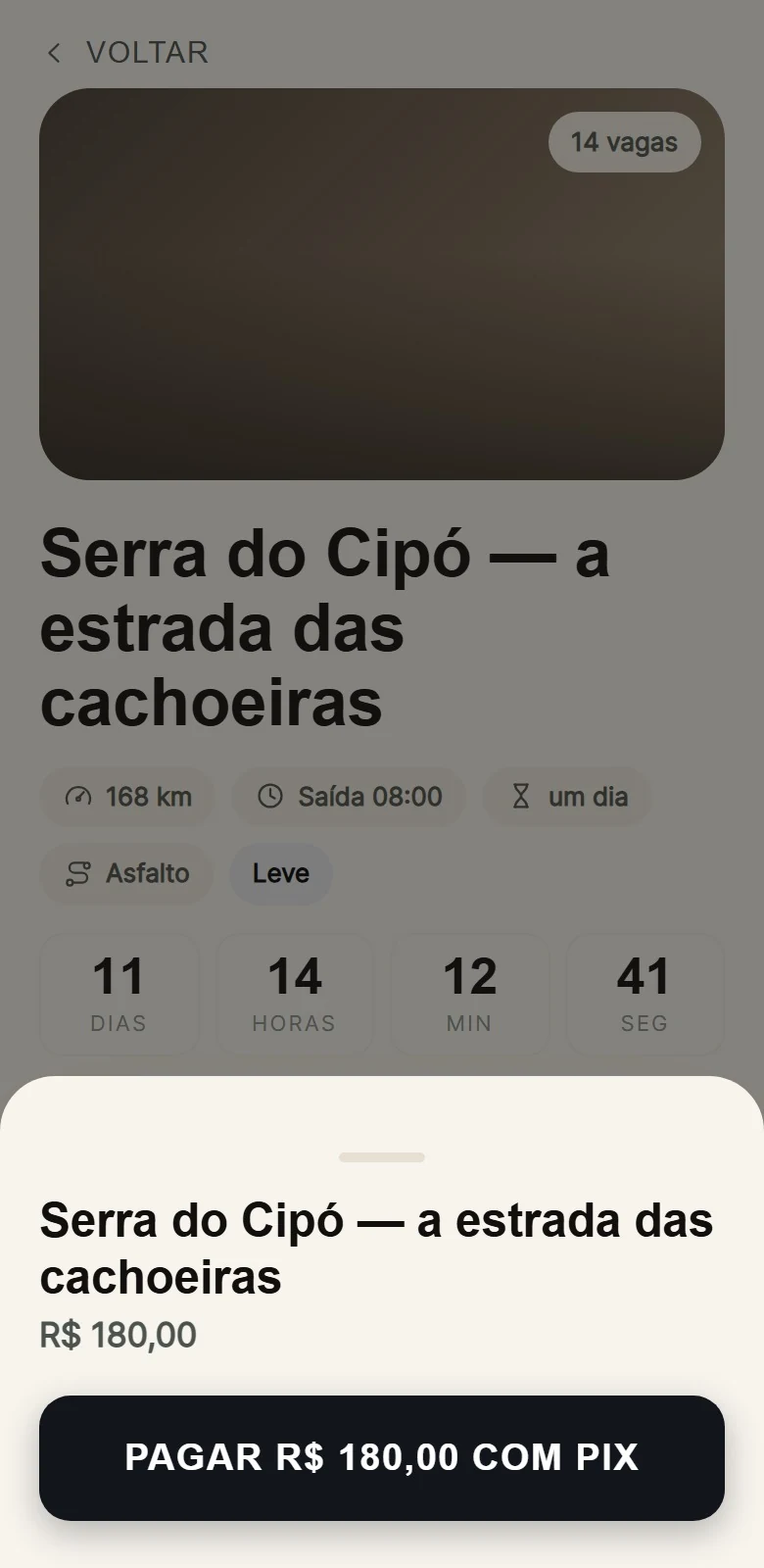 A folha de pagamento aberta sobre o passeio, com o botão de pagar R$ 180,00 com Pix